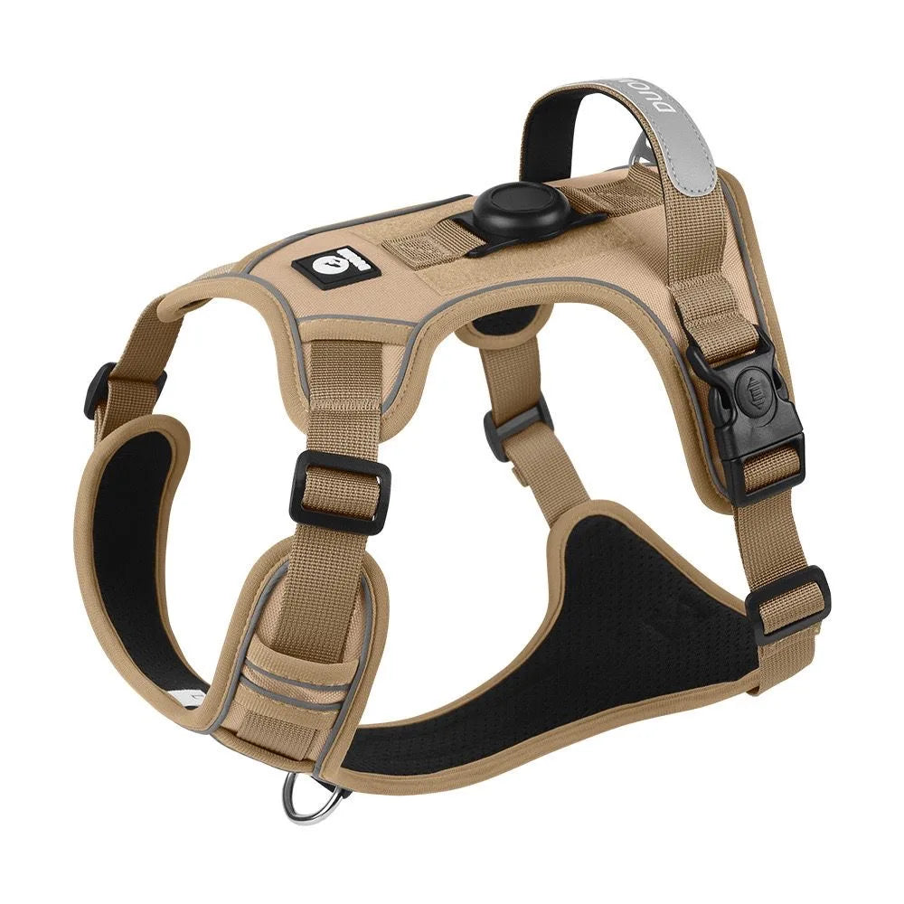Tan and black dog harness on a white background