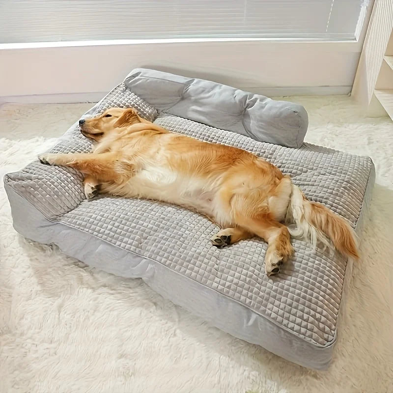 Golden retriever lying on soft grey orthopedic dog bed